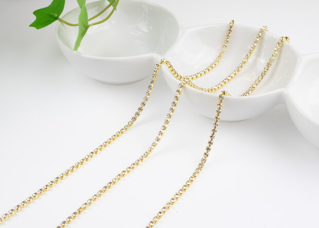 Strassketting 3 mm (SS12) Crystal - Gold Cup (per meter)