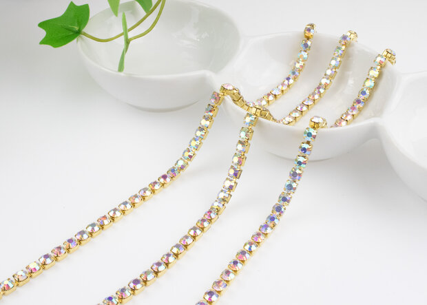 Strassketting 5 mm (SS20) Crystal AB - Gold Cup  (per meter)